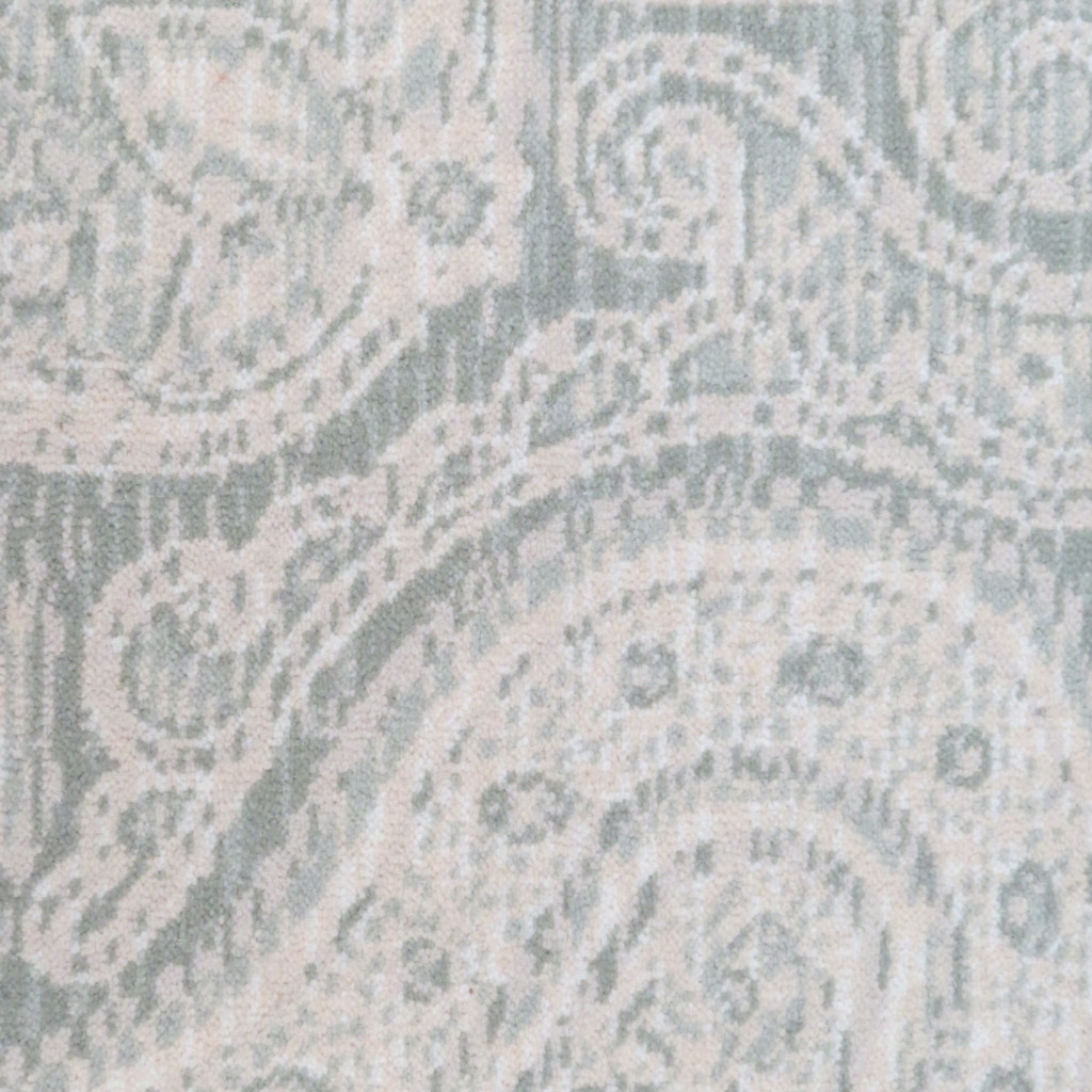 Bellbridge Provence color Spruce 10012/9 color swatch. Provence represents a very large damask design with striations in the ground. Colorway has sage green and cream tones.
