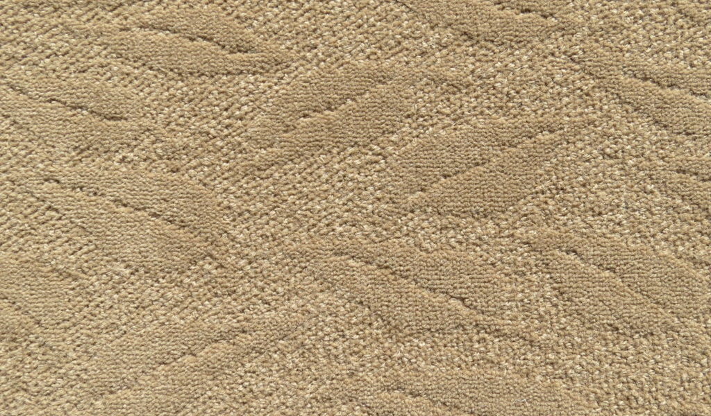 Bellbridge Falling Leaves Maple 37/9625 color swatch. Falling Leaves is constructed as a solid color tip shear with leaf design scattered randomly across the carpet. Color shown has a warm taupe hue.
