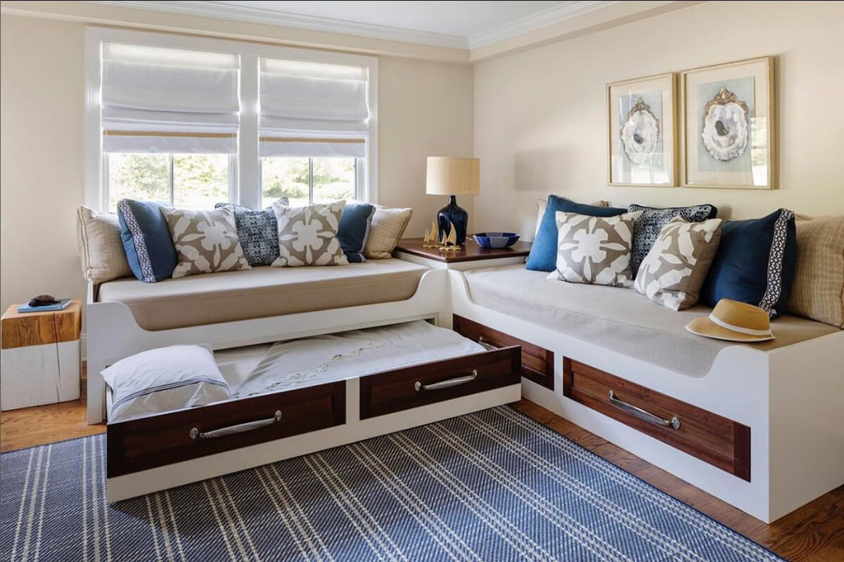 Hensley, Navy - Image credit: Digs Design, Newport, RI Hensley is a plaid design having 3 colors. Image shows Hensley rug in bedroom setting with furniture.