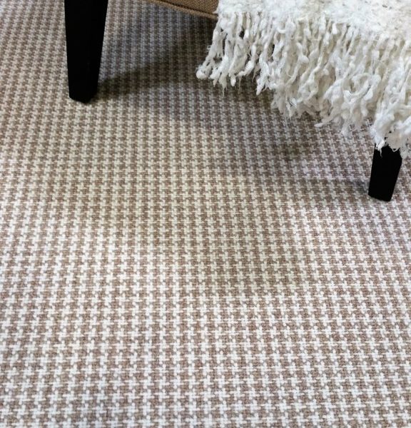 Madison, Color: Beige/Ivory 500/1502 color swatch. Madison is a hand loomed with 2 colors that create small houndstooth pattern. Image also shows chair and blanket used as props.