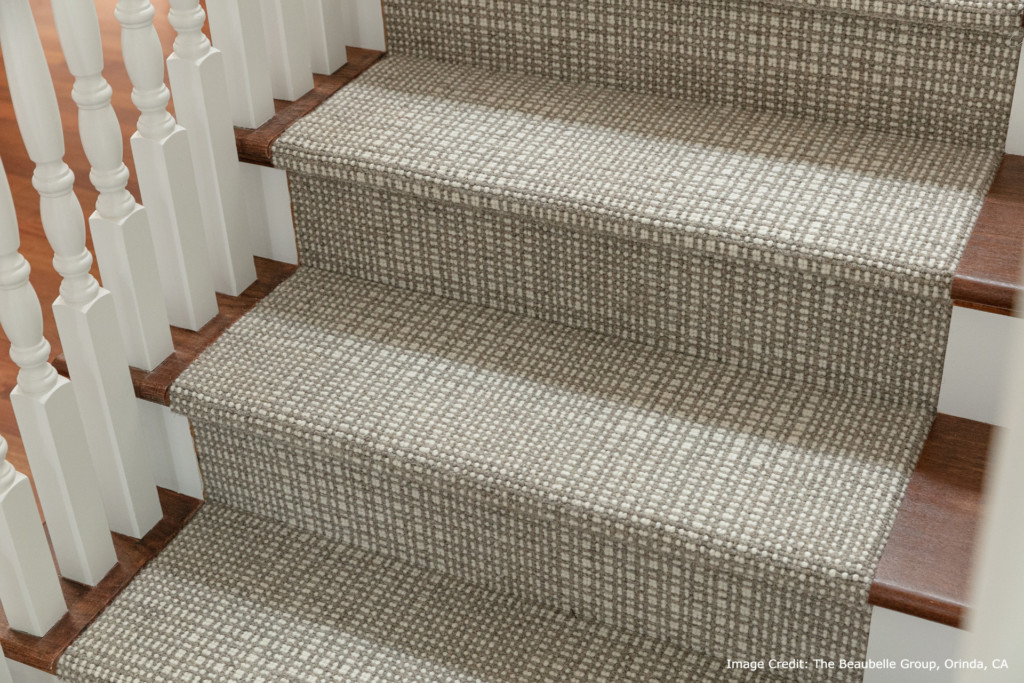 Grand Central, Color Pewter/Ivory 530/1501 installed on a stairwell. Grand Central is a large plaid design.