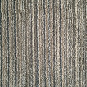 Discontinued color - Lineka Calima 55019/611 color swatch. Lineka is a cut pile with a linear pattern running down the length of the carpet. The linear design is created by varying yarn colors going across the width of the carpet. This colorway has colors of camel and brown.