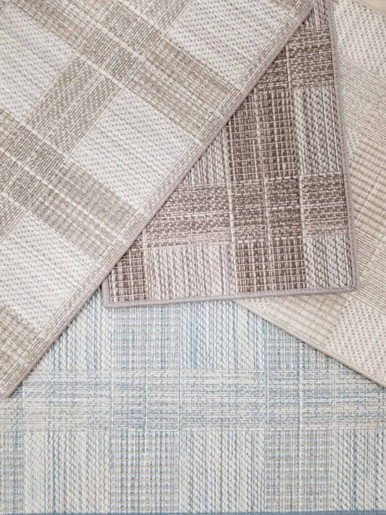 Crossings 5770 showing all four colorways. Crossings is a flatweave carpet created with striated yarns, woven in a box/plaid design.