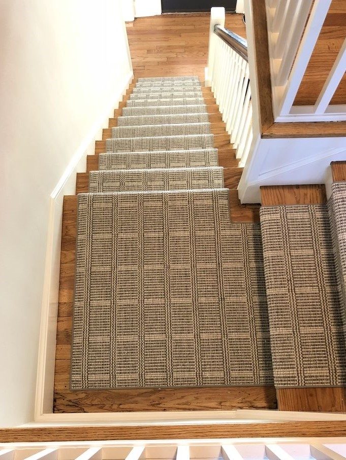Bellbridge Leighton Mink 750/1522 installed as stair runner. Leighton is an elongated grid design created by two dominant colors. Image credit: Carpet Works.