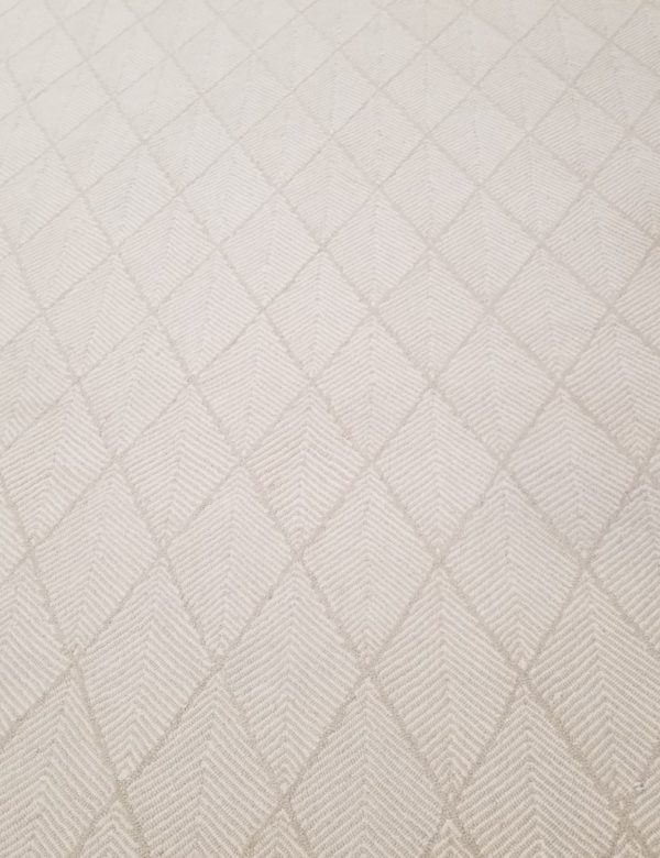 Pinnae, Color: Cream 680/1540 Pinnae, Color: Cream 680/1540 showing several repeats. Pinnae is hand tufted with 2 colors (cream and white) creating a large diamond motif.