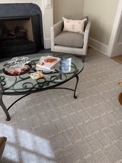 Leighton in room setting Room setting of Wilson residence featuring Bellbridge Leighton 1522. Leighton is an elongated grid design created by two dominant colors. Living area showing arm chair and sofa table.