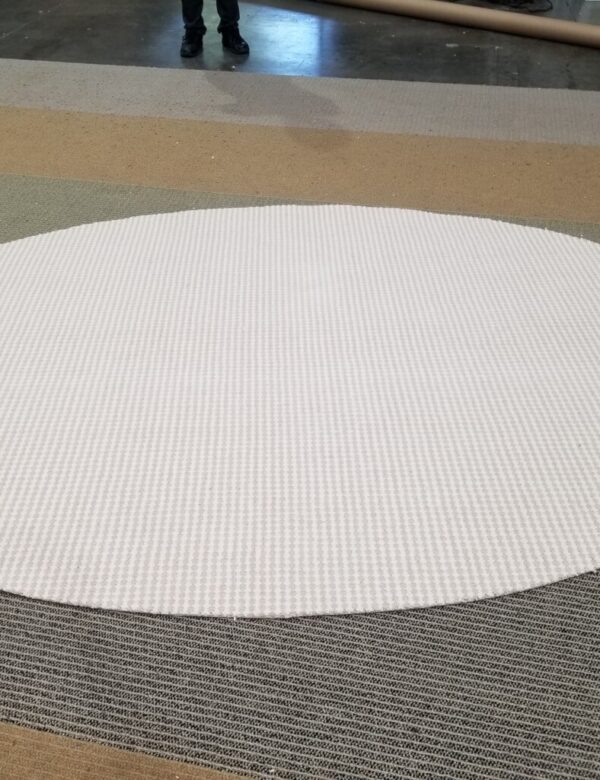 Lolly oval rug, Color: Lt Pink 660/1540 just cut for custom order. Lolly oval rug, Color: Lt Pink 660/1540. Oval rug just cut for custom order, waiting to be serged. Lolly has two colored dots (lt pink and ivory) that alternate to create the pattern.