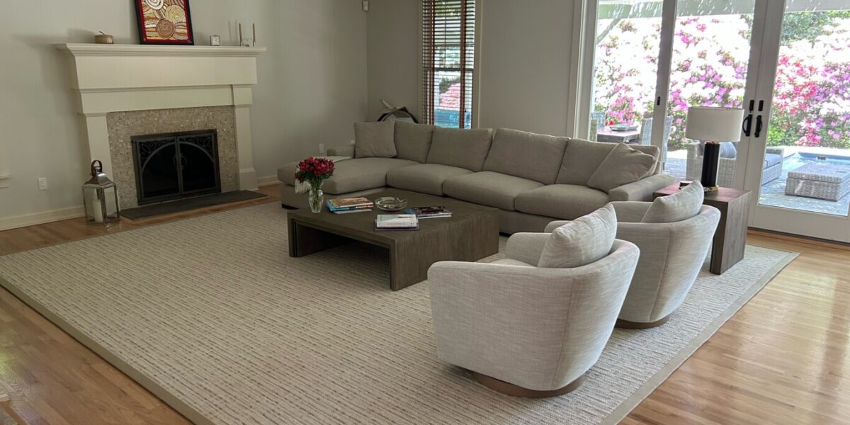 Journey rug finished with wide binding, Color: 47/5777 Lt Camel/Silver shown in Hamptons residence.