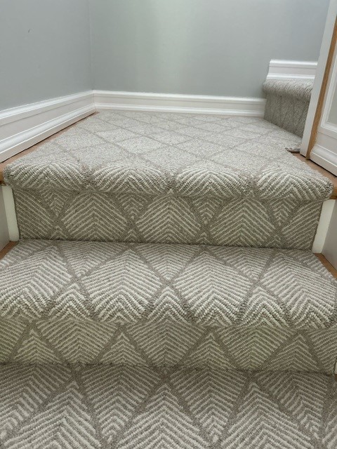 Pinnae, color: 570/1516 Steel Ivory installed on stairs Pinnae, color: 570/1516 Steel Ivory installed on stairs